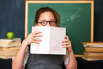 Image showing Shock, reading and portrait of child with a book in the classroom for education, learning or knowledge. Study, nerd and girl kid with glasses enjoying a story or novel with surprise face at school.