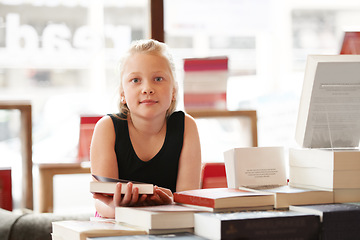 Image showing Girl child in portrait, book and education, story for knowledge or entertainment with customer in bookshop. Library, store and learn for development and growth, fiction or literature with young kid