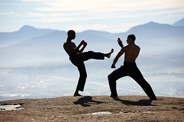 Image showing Karate, kick and and fitness men on mountain top for body, speed or performance training. Martial arts, defense or taekwondo workout by MMA friends in nature for morning cardio, exercise or sports