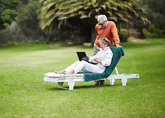 Image showing Love, relax and senior couple with laptop in garden for internet, search or communication while bonding. Social media, computer and old people chilling in backyard with online streaming subscription
