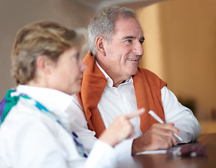 Image showing Hotel, reception and senior couple sign by check in desk for love, anniversary and relax. Retirement, hospitality resort and elderly man and woman with concierge for travel, holiday and vacation