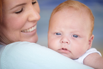 Image showing Baby, relax and portrait of newborn with mother in home holding infant and bonding together with a smile. Child, happiness and mom carrying boy in arms with love, care and support of mommy in house