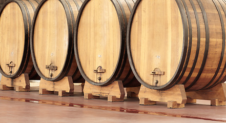 Image showing Background, wine production and wood barrel in brewery, alcohol industry and whiskey manufacturing. Liquor, drum container and beer storage in winery cellar, factory and distillery of empty warehouse