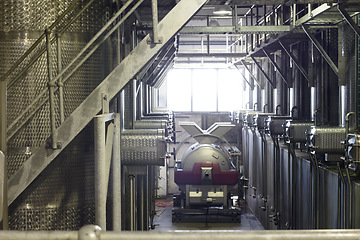 Image showing Background, wine factory and tank equipment for alcohol, whiskey and beer production, manufacturing and industry. Warehouse, steel container and industrial machine in winery, distillery and brewery