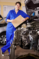 Image showing Portrait, happy man and technician with checklist on engine of car, repair or maintenance. Smile, mechanic and person with clipboard on motor hood, auto service and workshop, garage or small business
