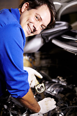 Image showing Portrait, smile and mechanic check oil on engine of car, repair and maintenance. Face, technician and happy man on motor vehicle, fixing transport or auto service inspection at shop of professional