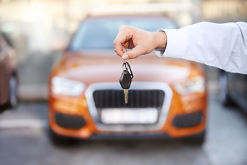 Image showing Car, outdoor and businessman with key in hand for sale of auto, transportation and investment. Vehicle, dealership or man with keys in parking lot from salesman for test drive, opportunity or driving