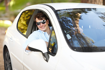 Image showing Happy, portrait and a man in a car for travel, drive or a journey on the road. Smile, morning and a person or driver in a vehicle, motor or transport for driving for a trip, traveling or a commute