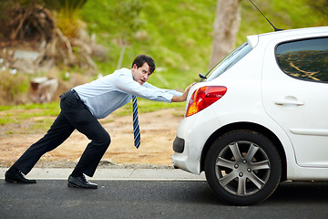 Image showing Businessman, push car or breakdown on road engine fail, emergency tyre or auto service. Male person, work transport and face or stress for petrol crisis travel risk, strength or oil accident repair
