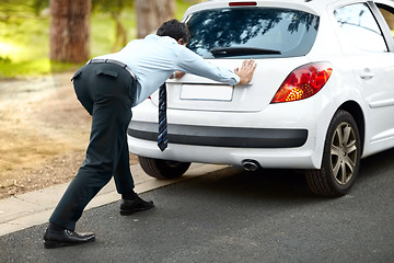 Image showing Businessman, push vehicle or breakdown on road engine fail, emergency tyre or auto service. Male person, strength and work car transport stop or gas petrol crisis travel, oil or risk accident repair