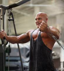 Image showing Body builder, exercise and man sweat in a gym with power, weightlifting machine and strength workout. Muscle, strain and strong athlete with training for bodybuilder fitness and wellness for sport