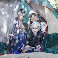 Image showing Camping, family and parents with children in rain sad for adventure, holiday and vacation in winter outdoors. Disappointed, unhappy and mother, father and kids in tent with bad weather for travel