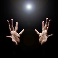 Image showing Hands, pray and help from God with praise, closeup of holy person with gratitude and respect for religion. Guide, wellness and lens flare, worship and faith with hope and trust on dark background