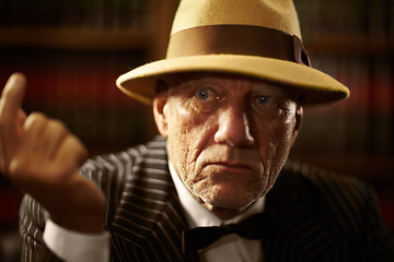 Image showing Mature, mafia and boss with serious look on face with fearless threat, power and reputation for organized crime. Elderly person, mob and gangster for vintage fashion, suit and bowtie in space