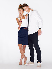 Image showing Fashion, dating and portrait of couple on a white background with trendy clothes, style and elegant outfit. Love, aesthetic and isolated man and woman in studio with confidence, relationship and care