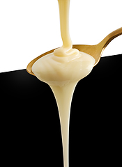 Image showing spoon of condensed milk