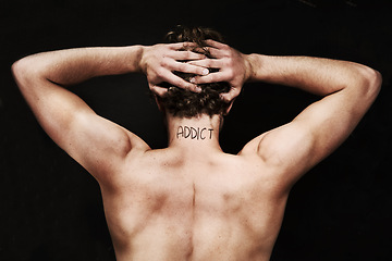 Image showing Back, drug addict and body of man in studio isolated on black background. Rear view, addiction and naked person with depression, anxiety and mental health crisis, challenge and substance abuse tattoo