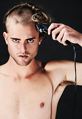 Image showing Portrait, body and serious man shaving hair or head in studio isolated on a black background. Face, haircut machine and naked person at hairdresser salon with trimmer for wellness, care and hairstyle