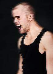 Image showing Frustrated, stress and blur of man shouting in studio isolated on a black background. Anger, anxiety and person screaming for mental health crisis, psychology or crazy trauma, depression or bipolar