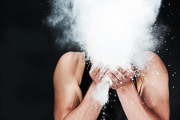 Image showing Man, throw and powder in face in studio on black background for mock up in fitness for gymnastics. Male athlete, chalk or dust for grip, hands and sports competition for strength, power or dedication