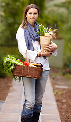 Image showing Woman, portrait and vegetables with bag, outdoor and smile with organic product, food and deal in park. Vegan lady, basket or container for shopping, discount or sale with deal, nutrition and diet