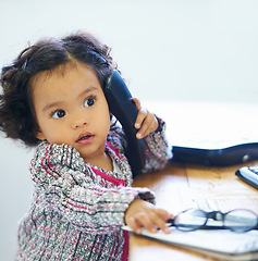 Image showing Little girl, phone and call play for imagine, communication or childhood funny joke. Female person, learning development and landline talking for game telephone or career growth fun and comedy