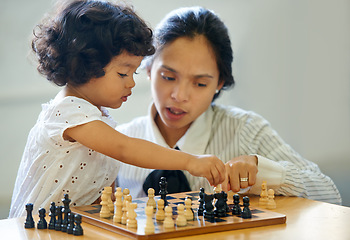 Image showing Mother, girl and chess board play for learning growth, development challenge or bonding time. Child, woman or game fun for problem solving intelligence or kids lesson, planning knowledge or education