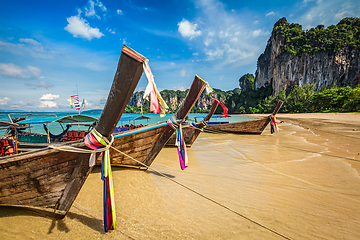 Image showing Long tail boats on beach, Thailand