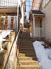 Image showing Norway house, staircase and nature with snow by porch in winter, ice or natural vacation location. Europe, travel and destination for adventure, ice weather and sustainable building for conservation