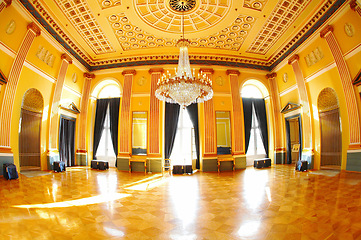Image showing Empty hotel hall, luxury ballroom for banquet or dance, space for conference or event. Architecture, interior and room, royal court floor and location with chandelier, sunshine in palace or mansion.