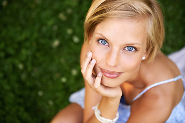 Image showing Smile, nature and portrait of woman in garden for holiday in summer on outdoor adventure mockup from above. Happiness, freedom and face of girl on grass in park for vacation countryside to relax.