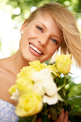 Image showing Relax, bouquet and portrait of happy woman in garden for holiday fun in spring with flowers in nature. Smile, freedom and face of girl in park with roses in countryside with sunshine on vacation.