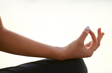 Image showing Closeup, woman and hand for yoga with meditation for wellness of health, mindset or zen with peace. Female person, fingers or half lotus pose for chakra, breathing or relaxing for practice by outdoor