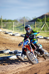 Image showing Person, motorcycle and dirt race track competition as .professional in action, danger or fearless risk. Bike rider, off road transportation or fast speed adventure rally, extreme sport on sand path