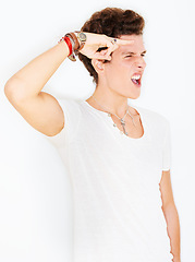 Image showing Man in casual fashion in studio with salute, crazy face and urban style and rebel youth attitude. Greeting hand gesture for attention, streetwear and gen z male model standing on white background.