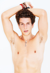 Image showing Portrait, skin and the body of a man in studio isolated on a white background for natural masculinity. Fitness, health and wellness with a shirtless young model looking confident at his bare physique