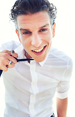 Image showing Male person, portrait and loose tie fun for cool confidence, carefree personality or stylish trend. Man, face and smile for edgy attitude outside in suit clothes, white background closeup or wet hair