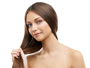 Image showing Studio, portrait and happy woman holding hair isolated in studio with strong hairstyle, confidence and smile. Haircare, natural keratin and face of model girl with healthy style on white background.