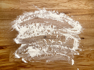 Image showing flour on wooden table