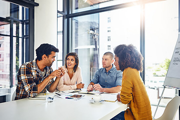 Image showing Office, meeting and planning with stats, data and analysis of report with market research for kpi and goals. Analytics, graphs and people at table in London workplace with online marketing strategy