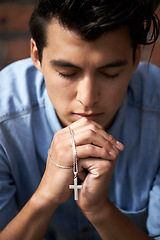 Image showing Man, hands and praying with crucifix for faith, worship and spirituality for soul, support and belief. Male person, confession and hope for forgiveness from god, gratitude and trust in religion