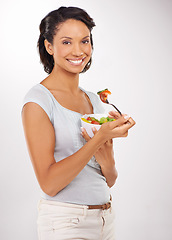 Image showing Happy woman, portrait and salad for fruit diet, snack or natural nutrition against a studio background. Female person smile with organic food bowl for fiber, vitamins or healthy meal in wellness