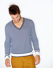 Image showing Fashion, clothes and casual with a model in studio on a white background for trendy hipster style. Man, natural and cool with a confident young person in a clothing outfit to relax for comfort