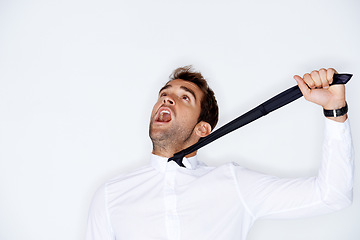 Image showing Stress, choke and tie with a business man in studio on a white background to fear or strangle. Depression, anxiety or mental health and a shouting young model choking his neck with a tight grip