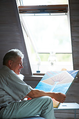 Image showing Man, artist or holding painting with pride in bedroom and happy elderly guy by window for creative art. Mature painter, design or retirement for watercolor drawing on canvas, talent artwork at home