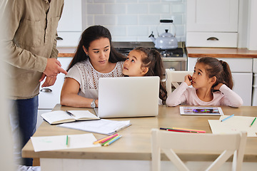 Image showing Whatever dad says goes. two parents helping their children with homework.