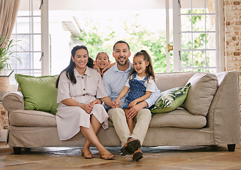 Image showing Home sweet home. a young family spending time together at home.