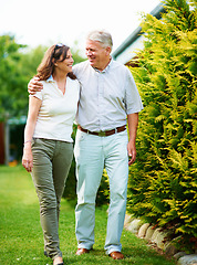 Image showing Mature, garden or happy couple hug in backyard or nature on a outdoor romantic walk for support. Wellness, smile or senior man with woman bonding, care or enjoying date in retirement or home together