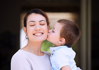 Image showing Enjoying some family fun. a mother carrying her son on the porch at home.