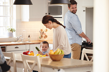 Image showing Mom loves having help in the kitchen. a young boy helping his mother in the kitchen.